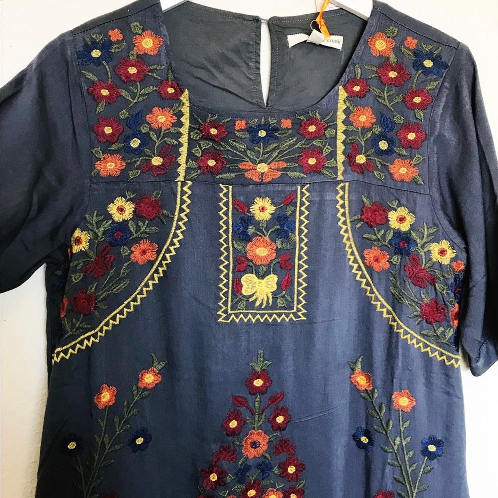 Embroidered midi dress from roolee boutique